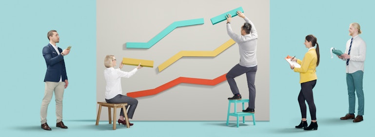 Bookkeepers constructing a line chart